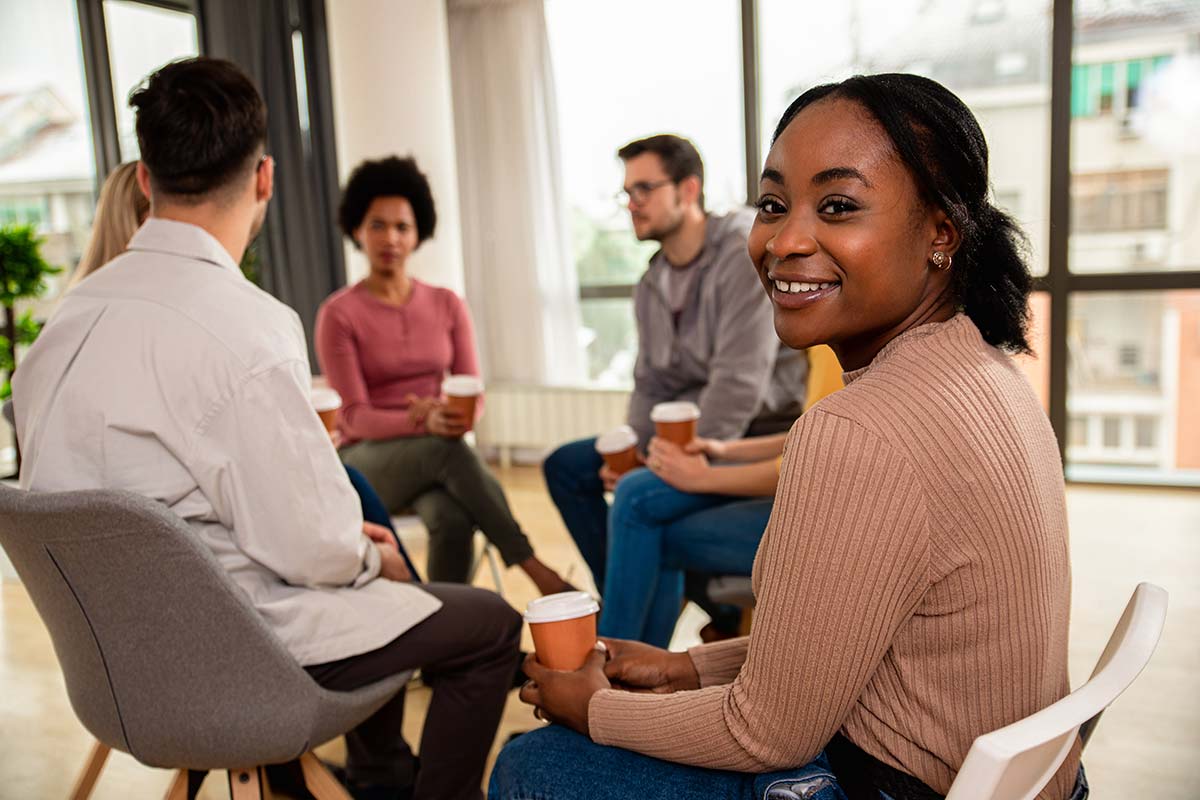 Individuals in group therapy in San Diego.